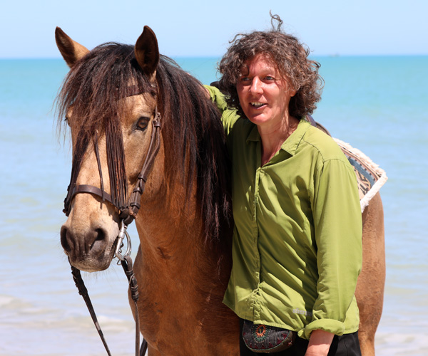 Fotoshooting mit Pferd am Strand